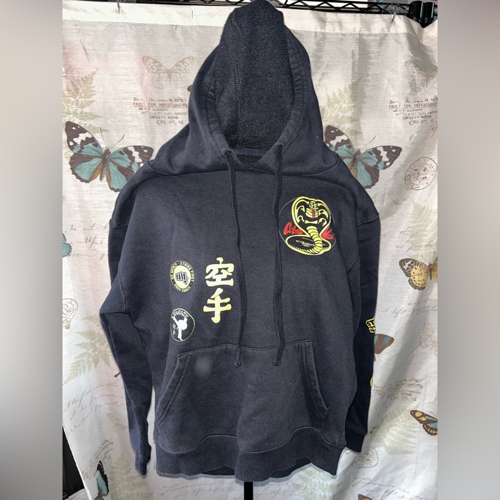 Bioworld cobra Kai Black Crewneck Hoodie‎ with Yellow Cobra Graphic